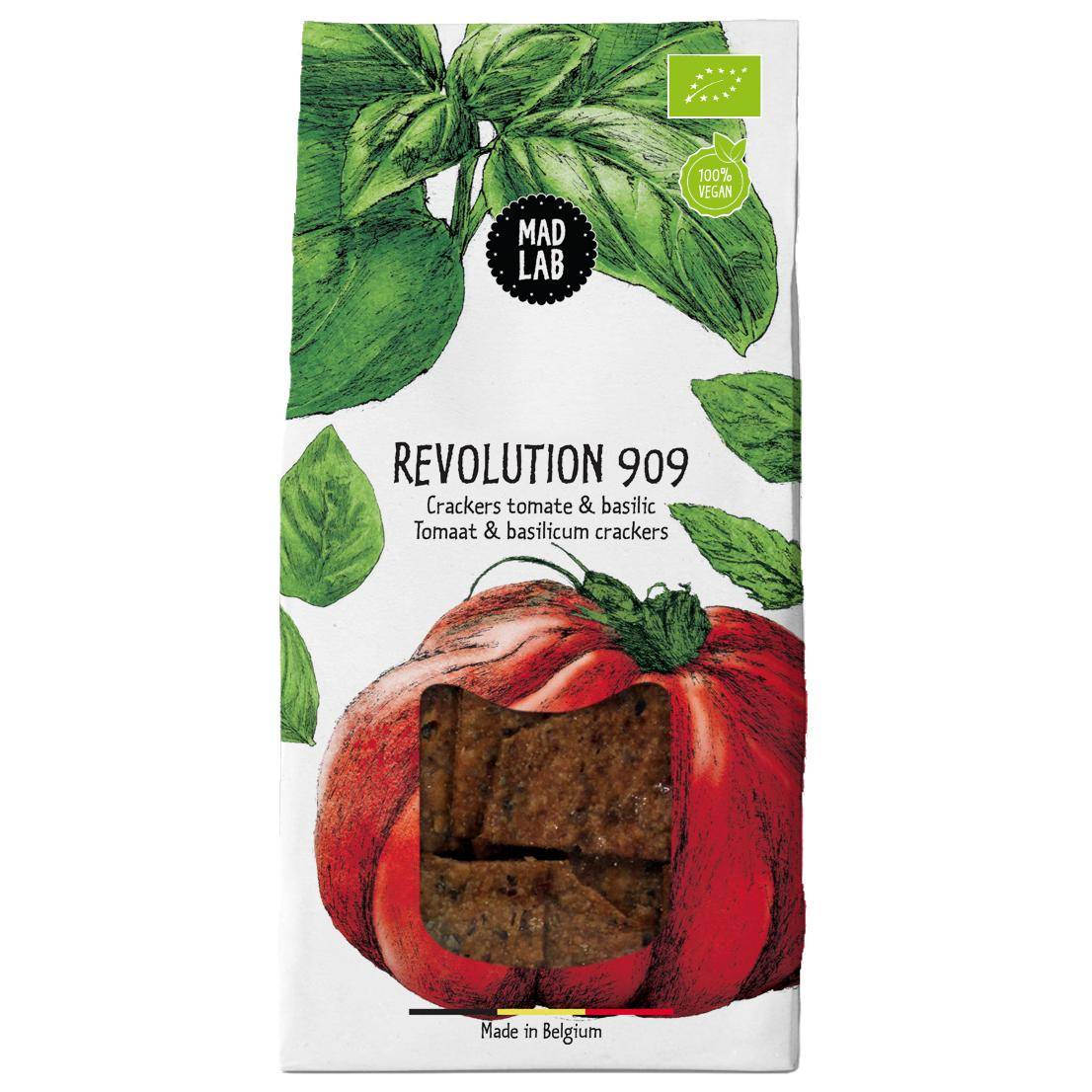 Mad Lab vegane Cracker mit Tomate und Basilikum– Verpackung aus weissem Papier mit farbiger, naturalistischer Illustration von Basilikum und einer grossen Tomate. 